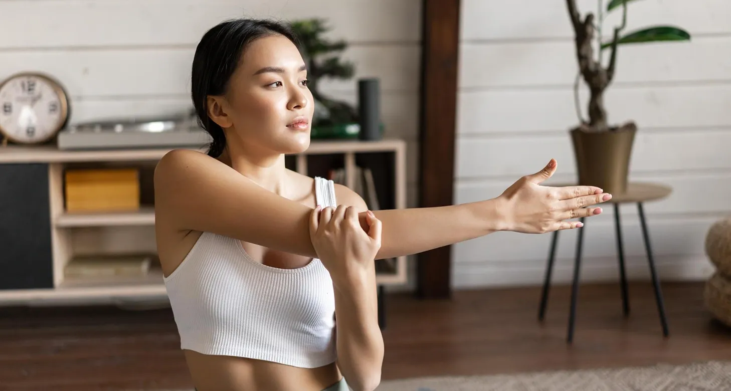 A therapist demonstrating a controlled movement