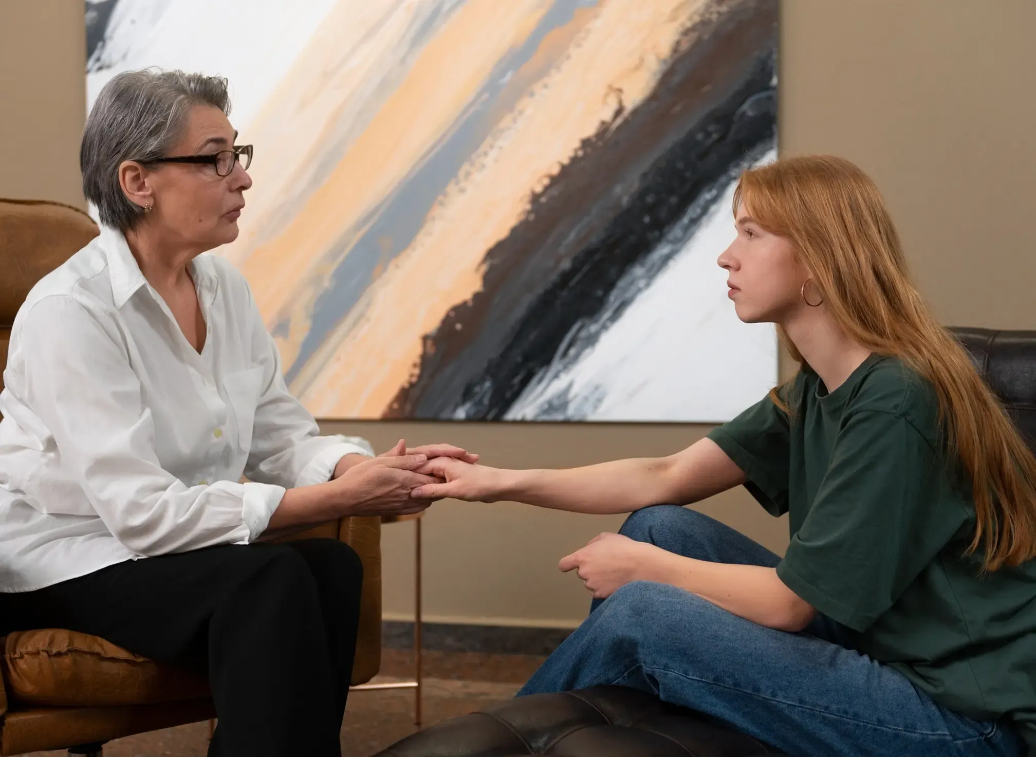 A calm, private therapy room with two armchairs