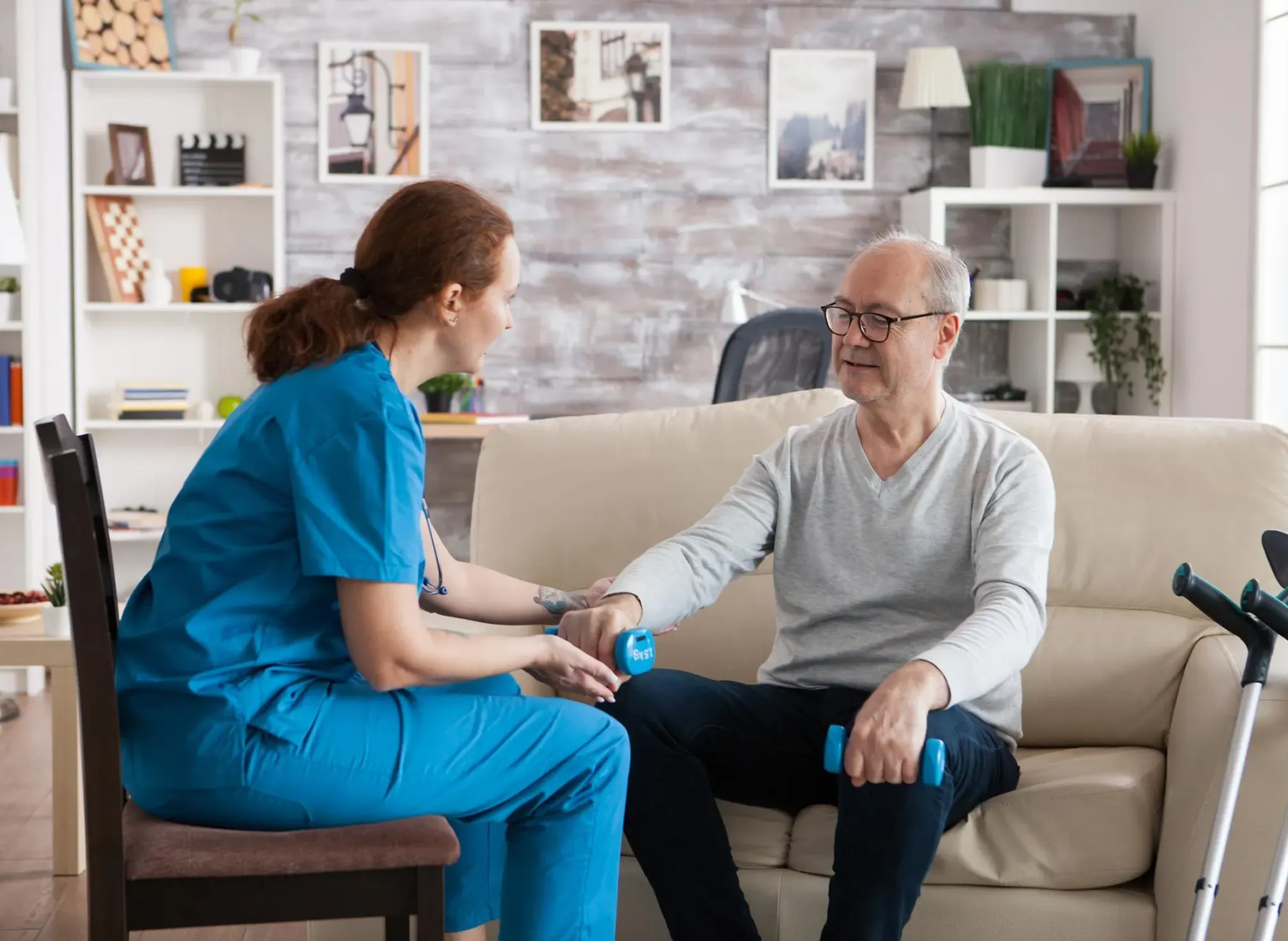 A therapist supporting a patient during balance practice